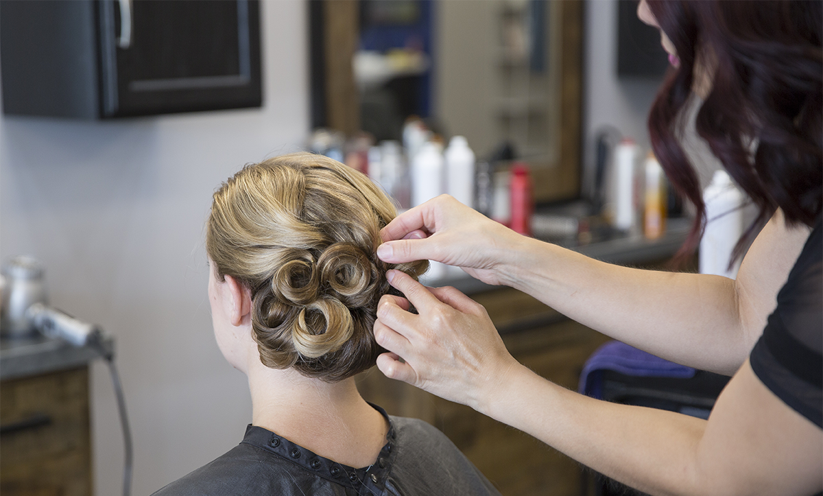 Formal wedding updo in progress